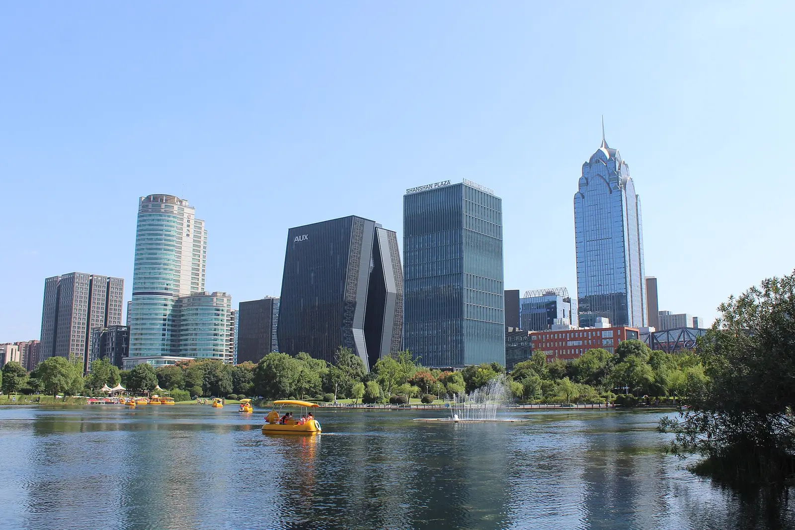 Ningbo South Business District towers beside a lake