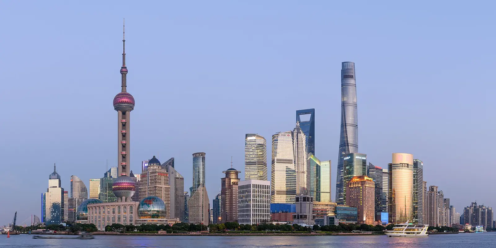 Pudong skyline across the Huangpu River at dusk